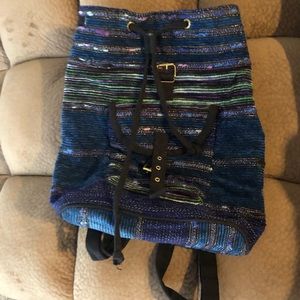 Top shop blue drawstring cloth backpack.